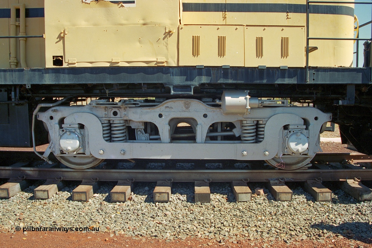 240-14
Wickham, right hand side number one end view of former Robe River and NSWGR MLW built ALCo RSC3 serial 77737 of October 1951, was originally 40 class 4006. Shows modified bogie to convert the A1A to a BO bogie type. 31st August 2002.
Keywords: 9401;MLW;ALCo;RSC3;77737;40-class;4006;