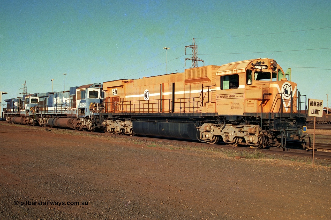 241-02
Nelson Point, Mt Newman Mining's last in-service ALCo M636 unit 5499 serial C6096-4 built by Comeng NSW sits awaiting partial dismantling before being sent by road to Rail Heritage WA's museum at Bassendean, Perth for preservation with two C36-7M units 5506 and 5510 also awaiting removal from site. June 2002.
Keywords: 5499;Comeng-NSW;MLW-ALCo;M636;C6096-4;