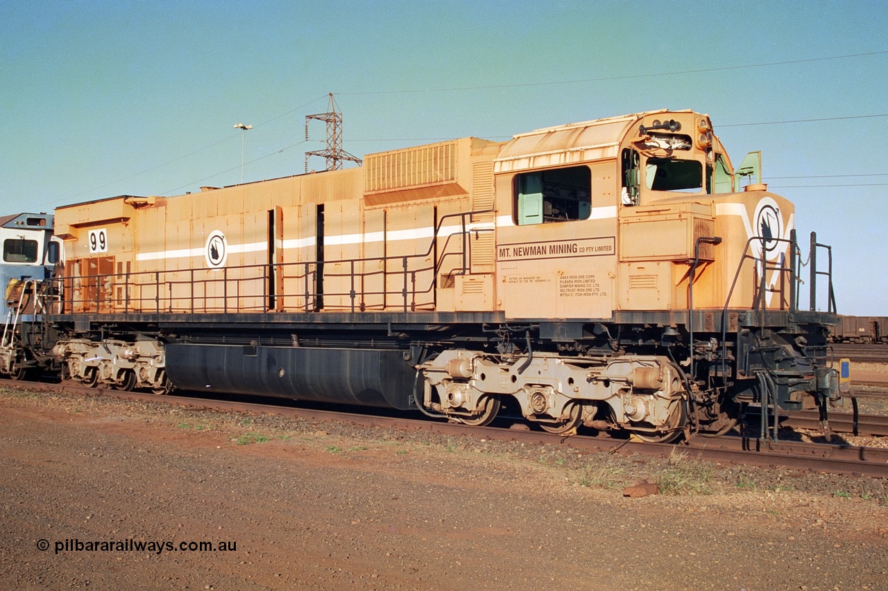 241-04
Nelson Point, Mt Newman Mining's last in-service ALCo M636 unit 5499 serial C6096-4 built by Comeng NSW sits awaiting partial dismantling before being sent by road to Rail Heritage WA's museum at Bassendean, Perth for preservation. June 2002.
Keywords: 5499;Comeng-NSW;MLW-ALCo;M636;C6096-4;