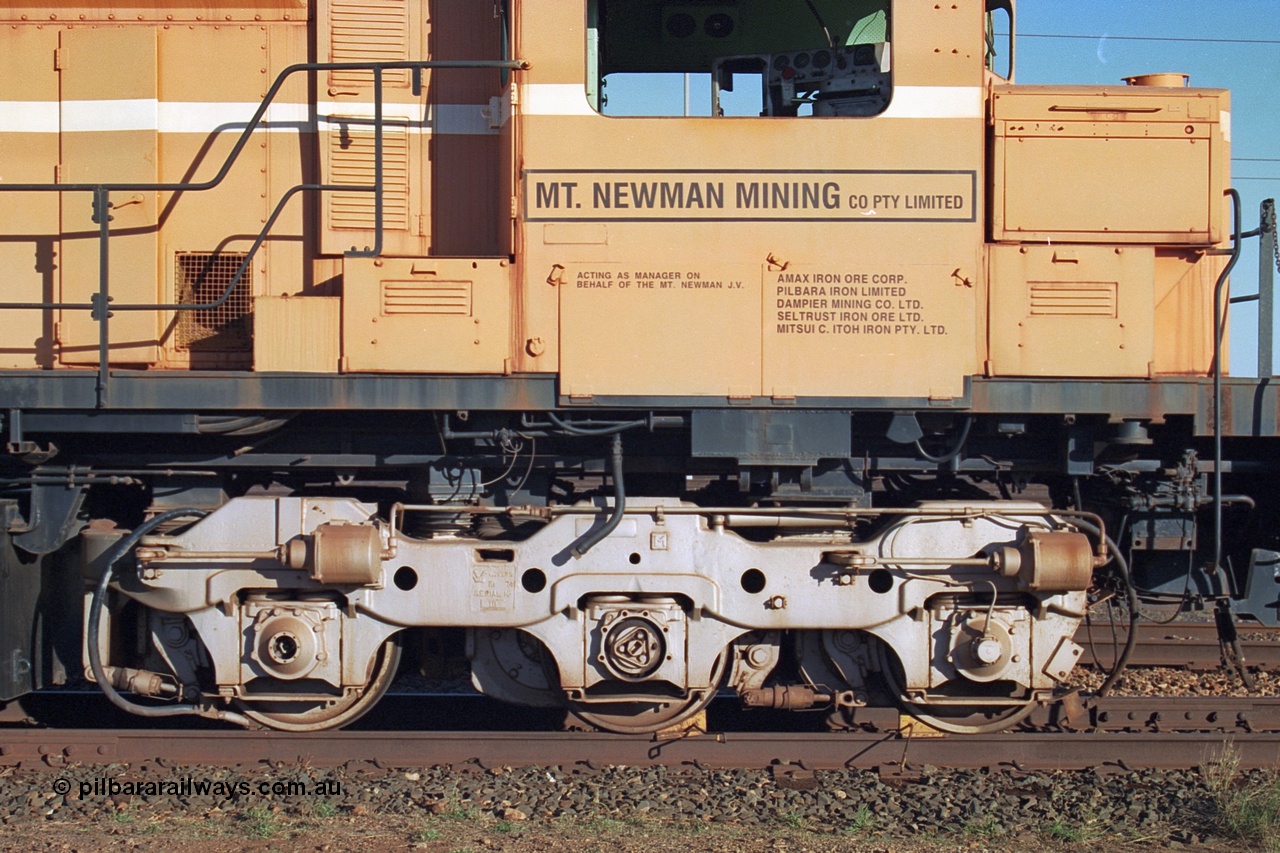 241-23
Nelson Point, Mt Newman Mining's last in-service ALCo M636 unit 5499 serial C6096-4 built by Comeng NSW sits awaiting partial dismantling before being sent by road to Rail Heritage WA's museum at Bassendean, Perth for preservation. Drivers side cab view. June 2002.
Keywords: 5499;Comeng-NSW;MLW-ALCo;M636;C6096-4;