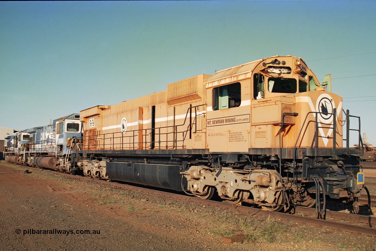 241-26
Nelson Point, Mt Newman Mining's last in-service ALCo M636 unit 5499 serial C6096-4 built by Comeng NSW sits awaiting partial dismantling before being sent by road to Rail Heritage WA's museum at Bassendean, Perth for preservation with two C36-7M units 5506 and 5510 also awaiting removal from site. June 2002.
Keywords: 5499;Comeng-NSW;MLW-ALCo;M636;C6096-4;