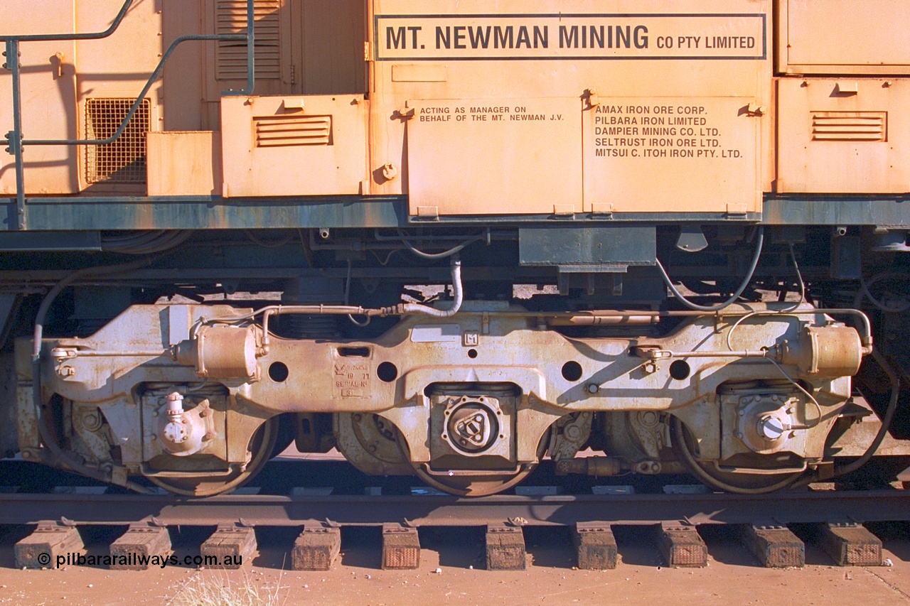 242-21
Port Hedland, Don Rhodes Mining Museum, preserved Mt Newman Mining Comeng NSW built ALCo M636 unit 5497 serial C6096-2, view of bogie. May 2002.
Keywords: 5497;Comeng-NSW;MLW-ALCo;M636;C6096-2;