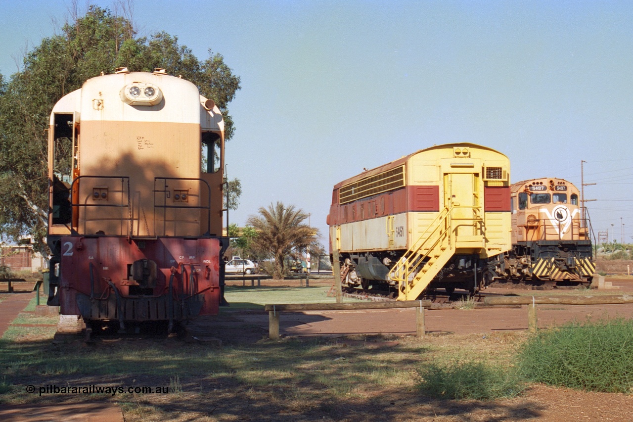242-27
Port Hedland, Don Rhodes Mining Museum, preserved locomotives from the early days of the Port Hedland iron ore miners of Goldsworthy Mining and Mt Newman Mining. From left is a Goldsworthy Mining B class unit #2 built by English Electric serial number A-105, Mt Newman Mining 5451 which was built by EMD as an F7A model and started life with Western Pacific in the USA and Mt Newman Mining 5497, a Comeng NSW built M636 ALCo unit. May 2002.
