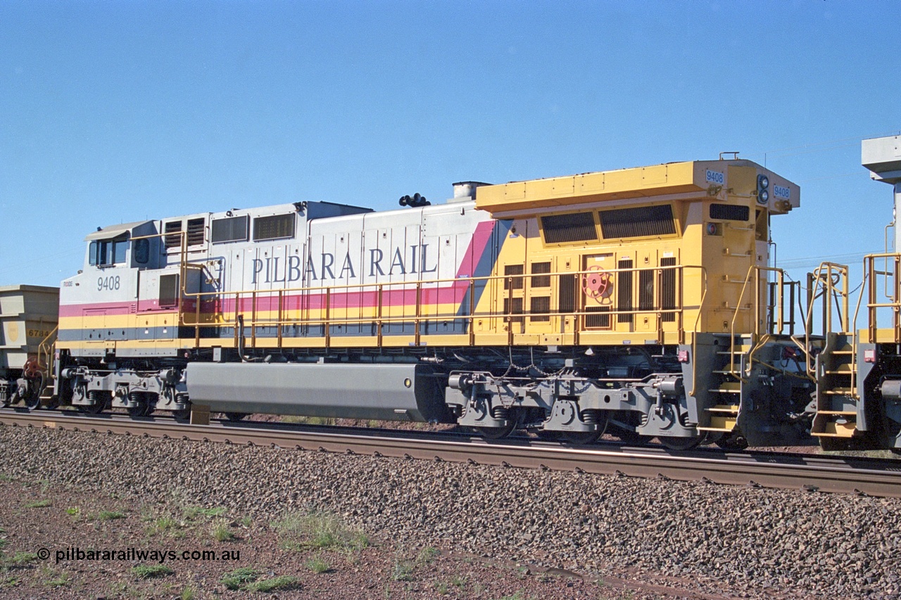 248-04
Dingo Siding on the Hamersley Iron railway at the 39 km with an empty train headed up by a pair of General Electric built Dash 9-44CW units 9408 serial 54158 from the fourth order in 2003 wearing the Pilbara Rail livery with Robe ownership markings. Approximate [url=https://goo.gl/maps/Jv752bD5KXv28oUV7]location[/url]. 24th April 2004.
Keywords: 9408;GE;Dash-9-44CW;54158;