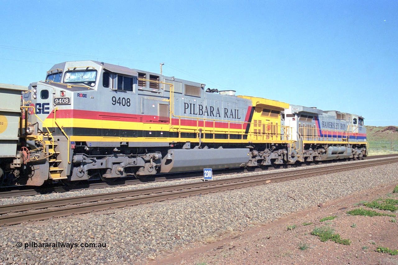 248-11
Dingo Siding on the Hamersley Iron railway at the 39 km with an empty train headed up by a pair of General Electric built Dash 9-44CW units 7077 serial 47756 from the original first order in the Pepsi Can livery and 9408 serial 54158 from the fourth order in the Pilbara Rail livery with Robe ownership markings. Approximate [url=https://goo.gl/maps/Jv752bD5KXv28oUV7]location[/url]. 24th April 2004.
Keywords: 9408;GE;Dash-9-44CW;54158;