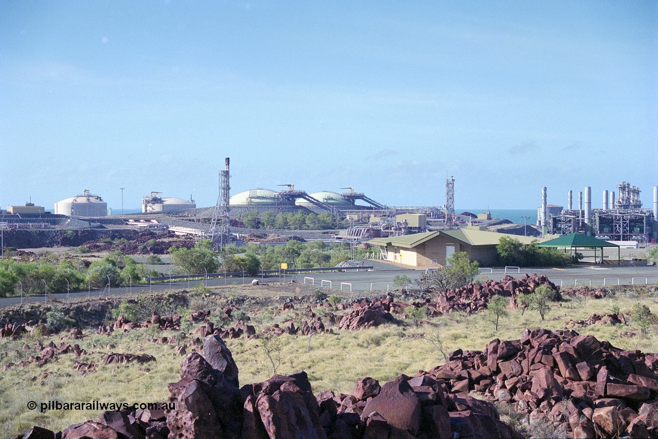249-37
Burrup Peninsula gas plant, view of storage tanks, plant and visitors centre. Approximate [url=https://goo.gl/maps/VnJ1jpgZBkq1ZPtR7]location[/url]. 18th December 1999.
