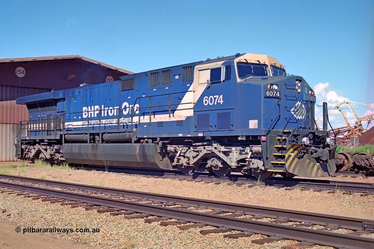 251-20
Nelson Point wheel lathe, BHP's General Electric built AC6000 model 6074 serial 51066 and yet to be named idles away outside the shop. 22nd April 2000.
Keywords: 6074;GE;AC6000;51066;