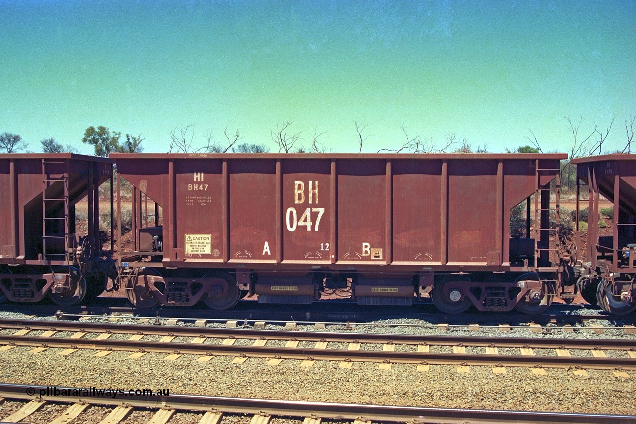 252-01
Cockatoo Siding 273 km on the Hamersley Iron line to Yandi, National Steel Car Company of Canada built ballast hopper waggon BH 047 built in January 1971. A batch of twenty were built for Hamersley Iron. Location is roughly [url=https://goo.gl/maps/gNdgoAj6uJoYb2q36]here[/url]. 24th November 2001.
Keywords: BH-type;BH047;National-Steel-Car-Canada;Rio-ballast-waggon;