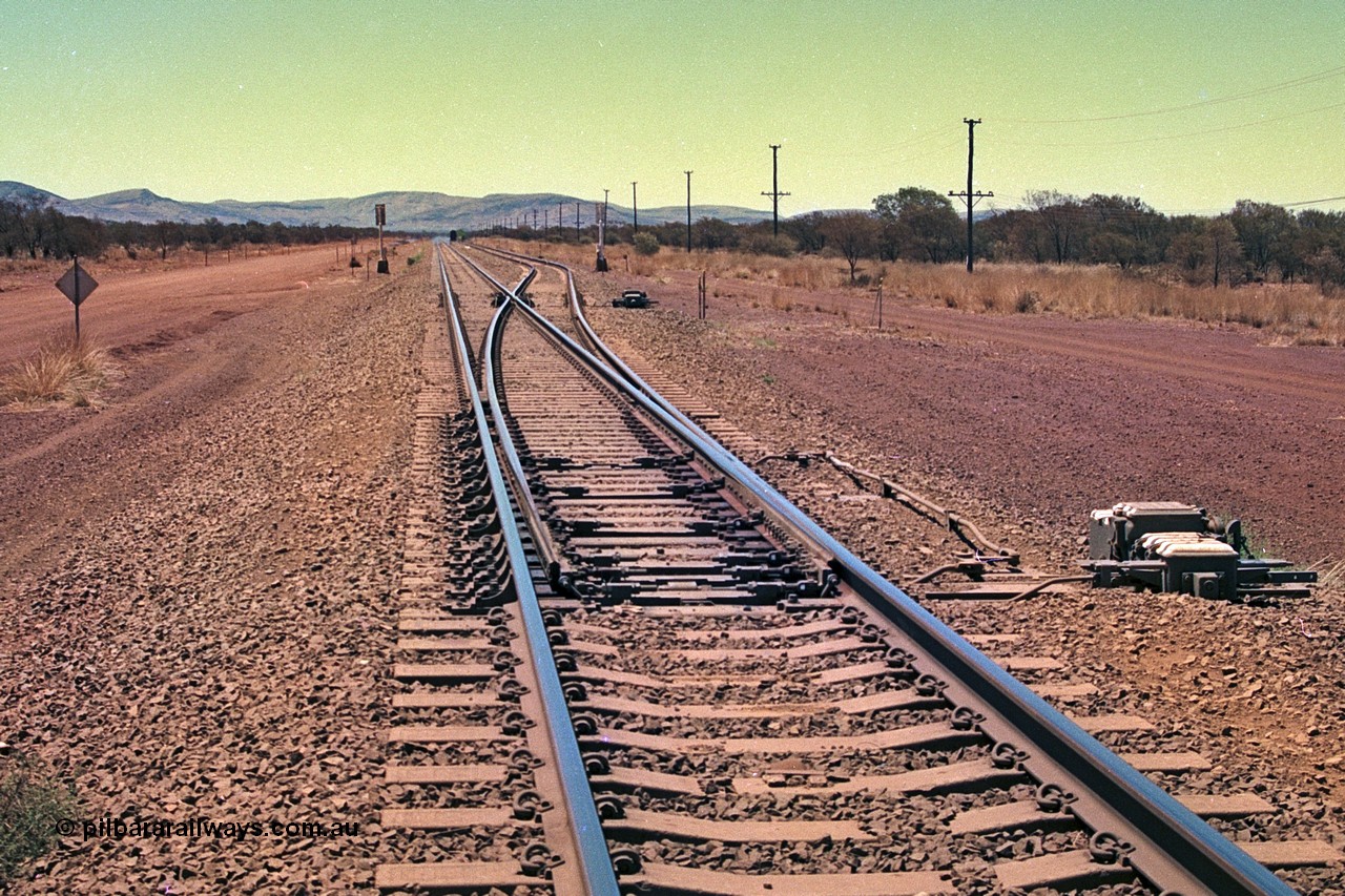 252-18
Rosella Siding looking north from the south end. Dampier is 250 km away. Location is roughly [url=https://goo.gl/maps/q3opSy2bPxpd8nv79]here[/url]. 24th November 2001.
