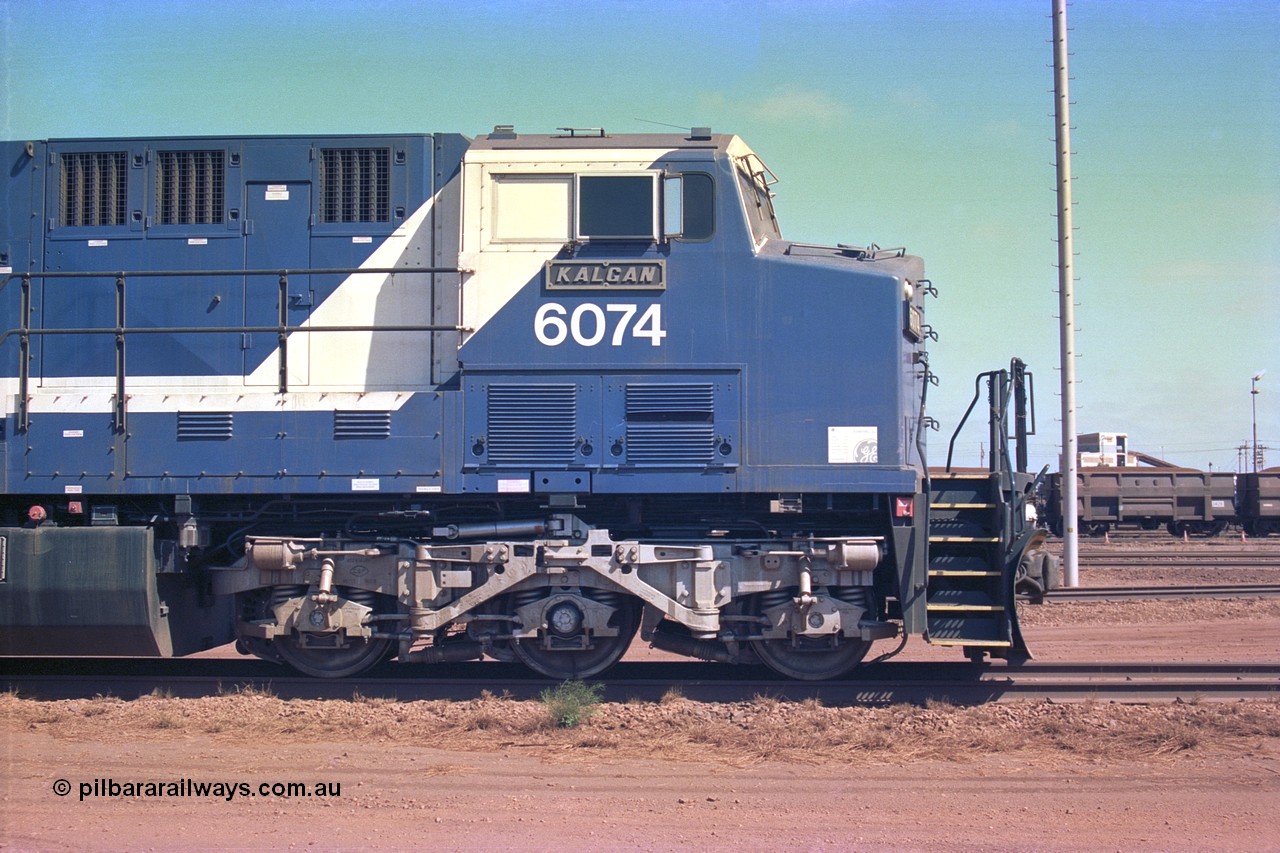 252-22
Nelson Point cab side view of BHP Iron Ore's General Electric built AC6000 unit 6074 'Kalgan' serial number 51066 is shutdown near the wheel lathe. Early December 2001.
Keywords: 6074;GE;AC6000;51066;