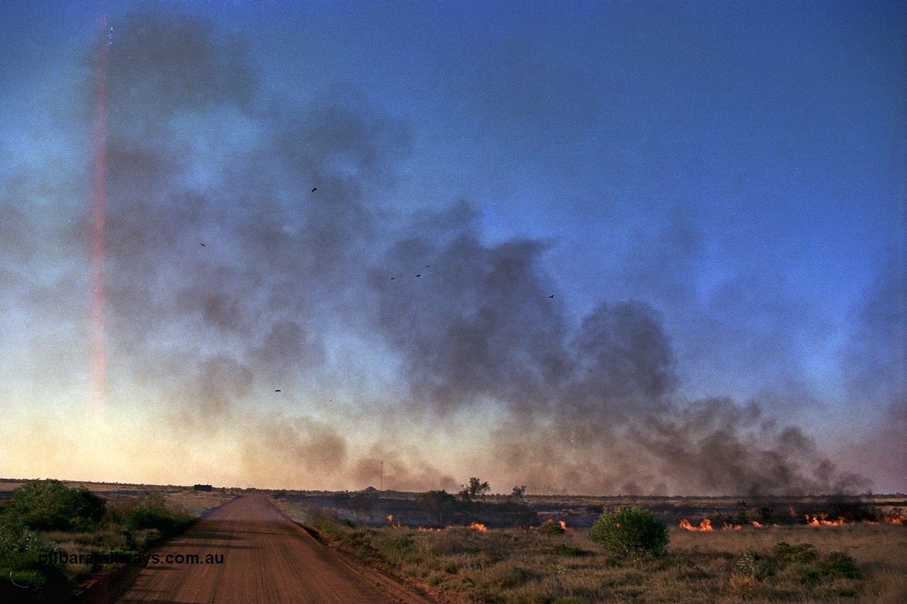 254-06
Walla Siding, 55 km area, spinifex fire beside the access road.
