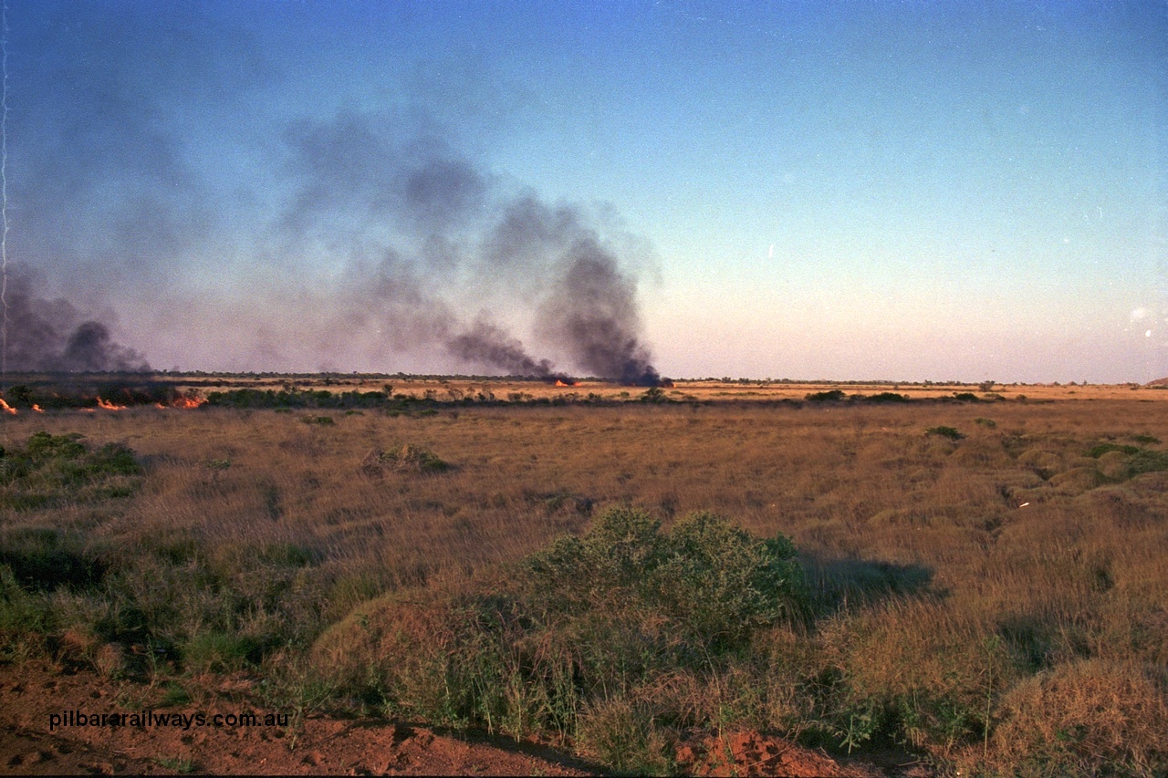 254-07
Walla Siding, 55 km area, spinifex fire beside the access road.
