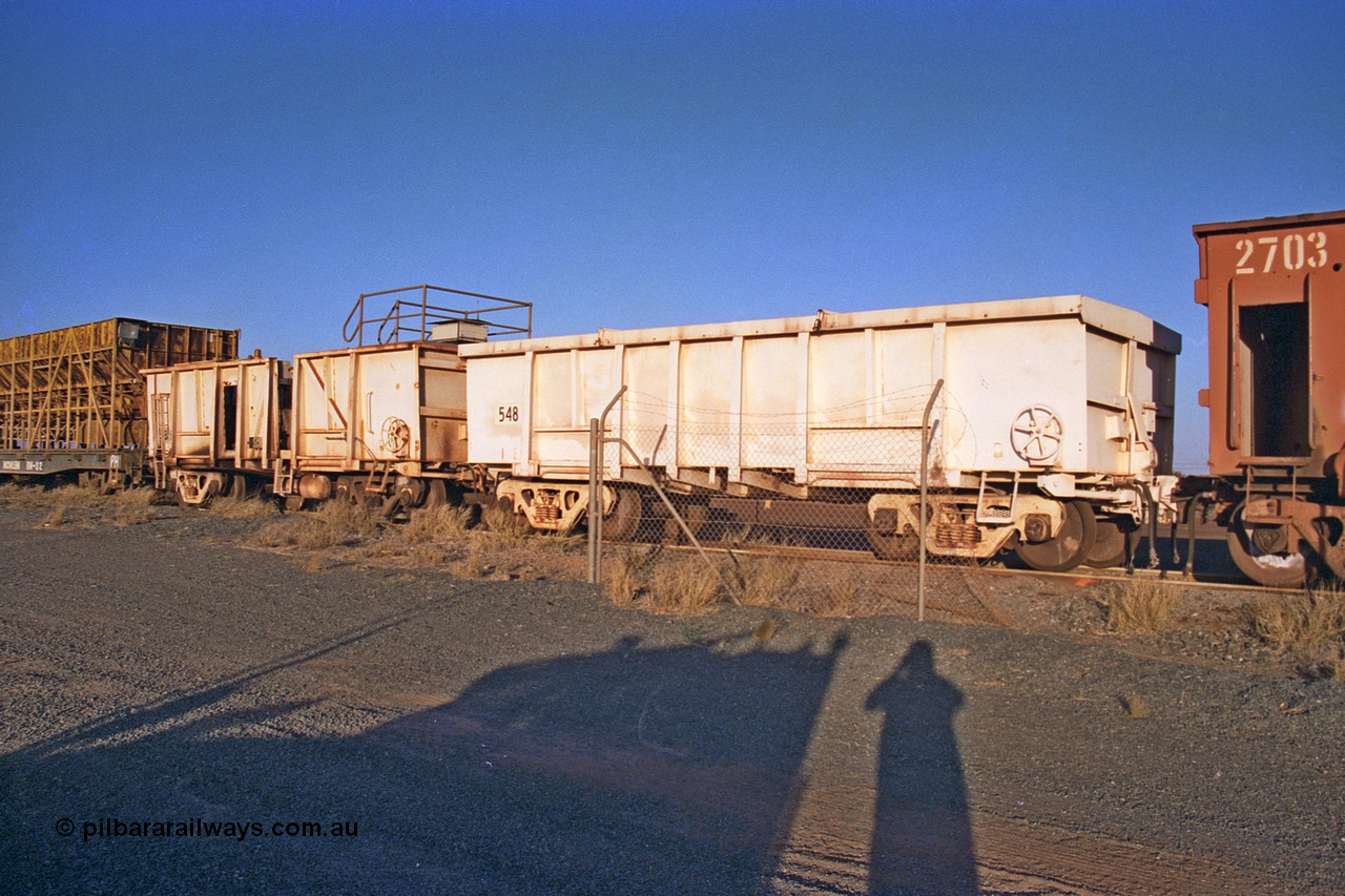 257-21
Flash Butt yard, compressor set #5. Modified Magor USA built ore waggons to form the compressor set, used during the unloading process. Late 2001.
Keywords: Magor-USA;BHP-compressor-waggon;