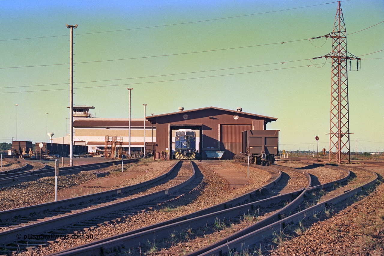 258-32
Nelson Point, Wheel Lathe shop with Ore Car Repair Shop and Yard Control behind it. General Electric built AC6000 locomotive 6074 'Kalgan' is out the front. Early May 2002.
Keywords: 6074;GE;AC6000;51066;