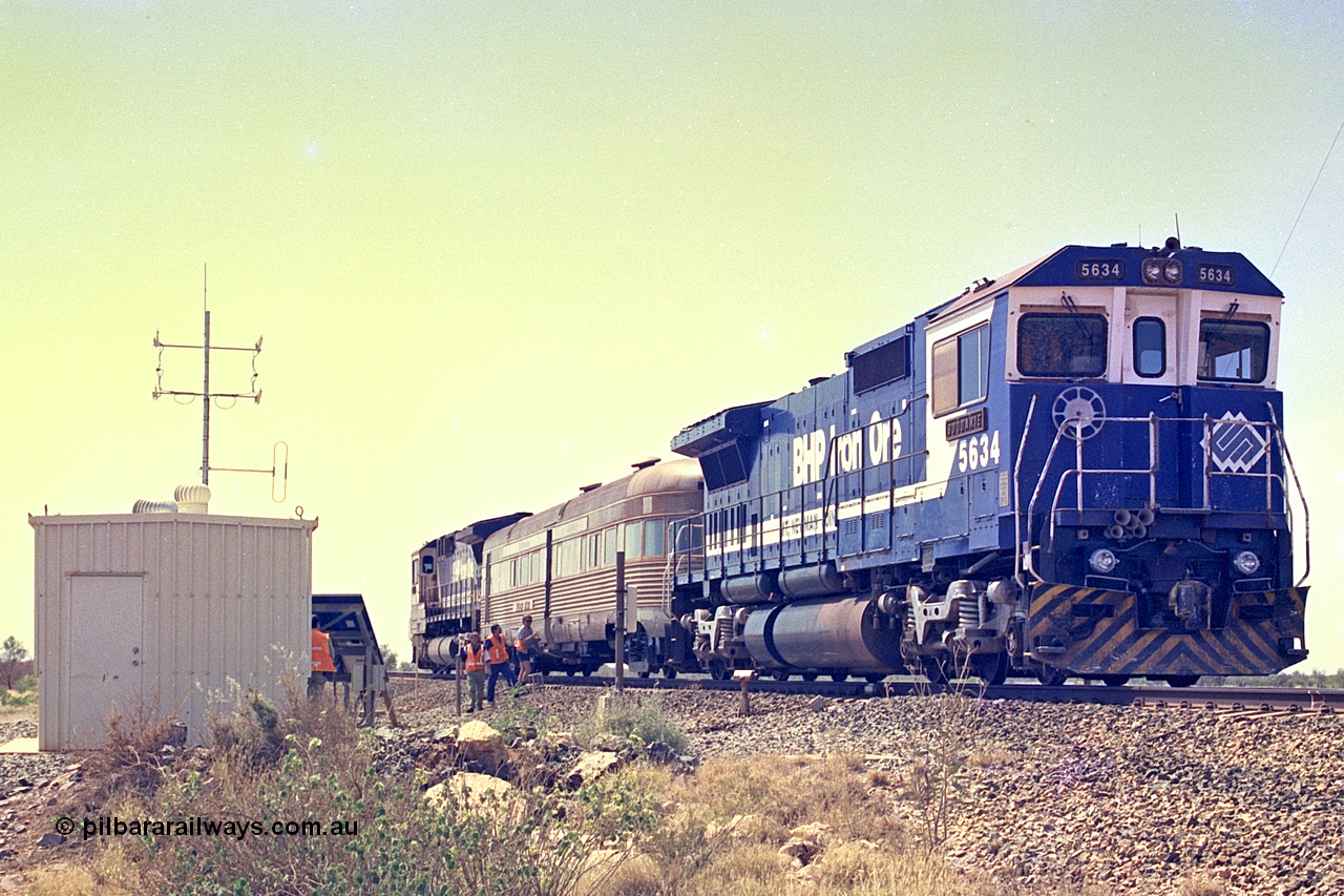 267-37
At the 39 km detection site with the Alstom 25-year service agreement special, BHP Iron Ore's Goninan GE rebuild CM40-8M unit 5634 'Boodarie' serial number 8151-07 / 91-120 stands on the Newman mainline with the train as the party alight for an inspection of the site.Friday 12th of April 2002.
Keywords: 5634;Goninan;GE;CM40-8M;8151-07/91-120;rebuild;AE-Goodwin;ALCo;C636;5457;G6027-1;