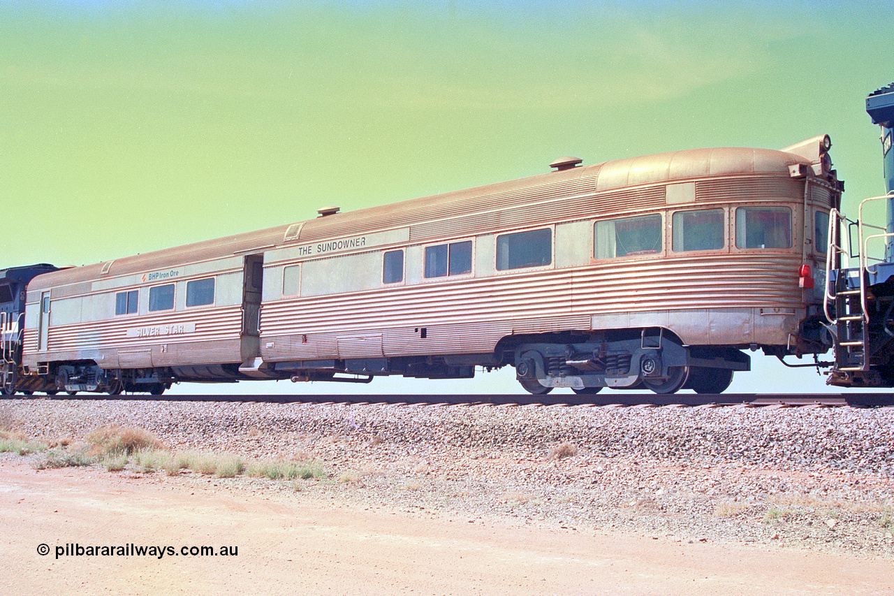 268-32
At the 39 km detection site with the Alstom 25-year special, view from the No. 2 End of the Sundowner coach, originally built by E. G. Budd in 1939 numbered 301 as the Silver Star, a diner-parlour-observation coach on the Chicago, Burlington and Quincy Railroad's General Pershing Zephyr train from the 1930s and 1940s. Donated to Mt Newman Mining Co. by AMAX an original joint venture partner to commemorate the projects first 100 million tonnes of iron ore railed between Mount Whaleback mine and the Port Hedland port. 12th of April 2002.
Keywords: Silver-Star;EG-Budd;Sundowner;General-Pershing-Zephyr;301;
