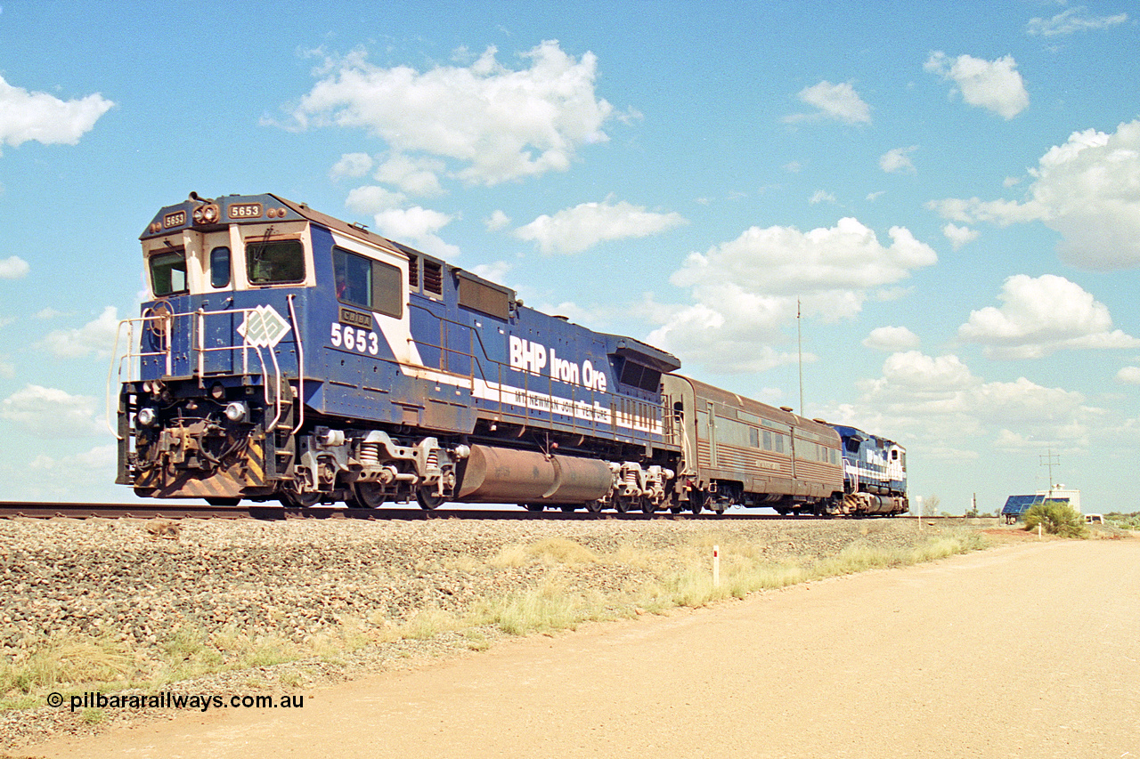 269-13
At the 39 km detection site with the Alstom 25-year service agreement special, BHP Iron Ore's Goninan GE rebuild CM40-8M unit 5653 'Chiba' serial number 8412-10 / 93-144 heads back to Nelson Point with The Sundowner and 5634 on the rear of the train. Friday 12th of April 2002.
Keywords: 5653;Goninan;GE;CM40-8M;8412-10/93-144;rebuild;AE-Goodwin;ALCo;M636C;5484;G6061-5;