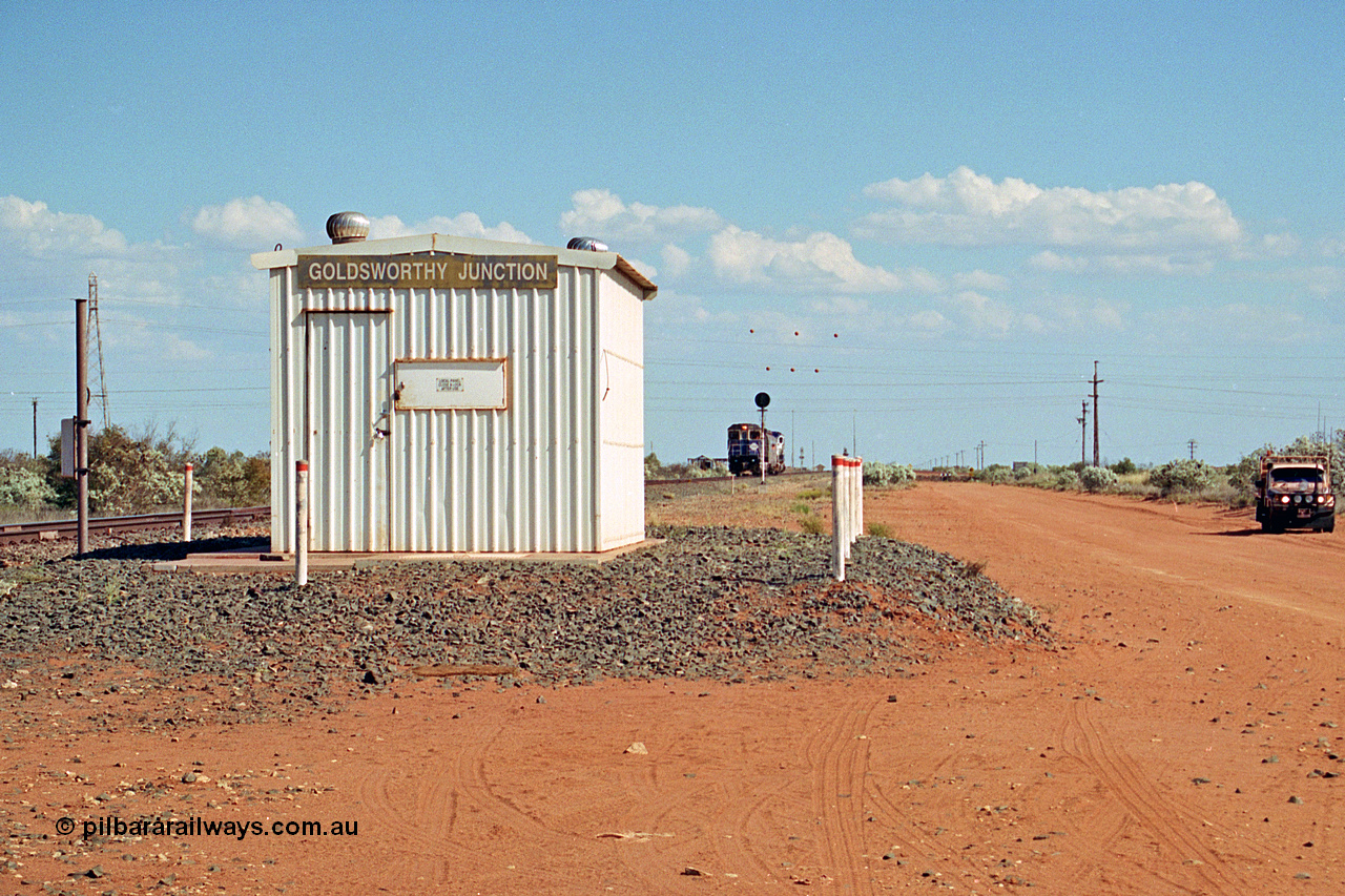 269-19
Goldsworthy Junction, and the Alstom 25-year service agreement special led by BHP Iron Ore's Goninan GE rebuild CM40-8M unit 5653 'Chiba' serial number 8412-10 / 93-144 heads back to Nelson Point with The Sundowner and 5634 on the rear of the train. Friday 12th of April 2002.
Keywords: 5653;Goninan;GE;CM40-8M;8412-10/93-144;rebuild;AE-Goodwin;ALCo;M636C;5484;G6061-5;