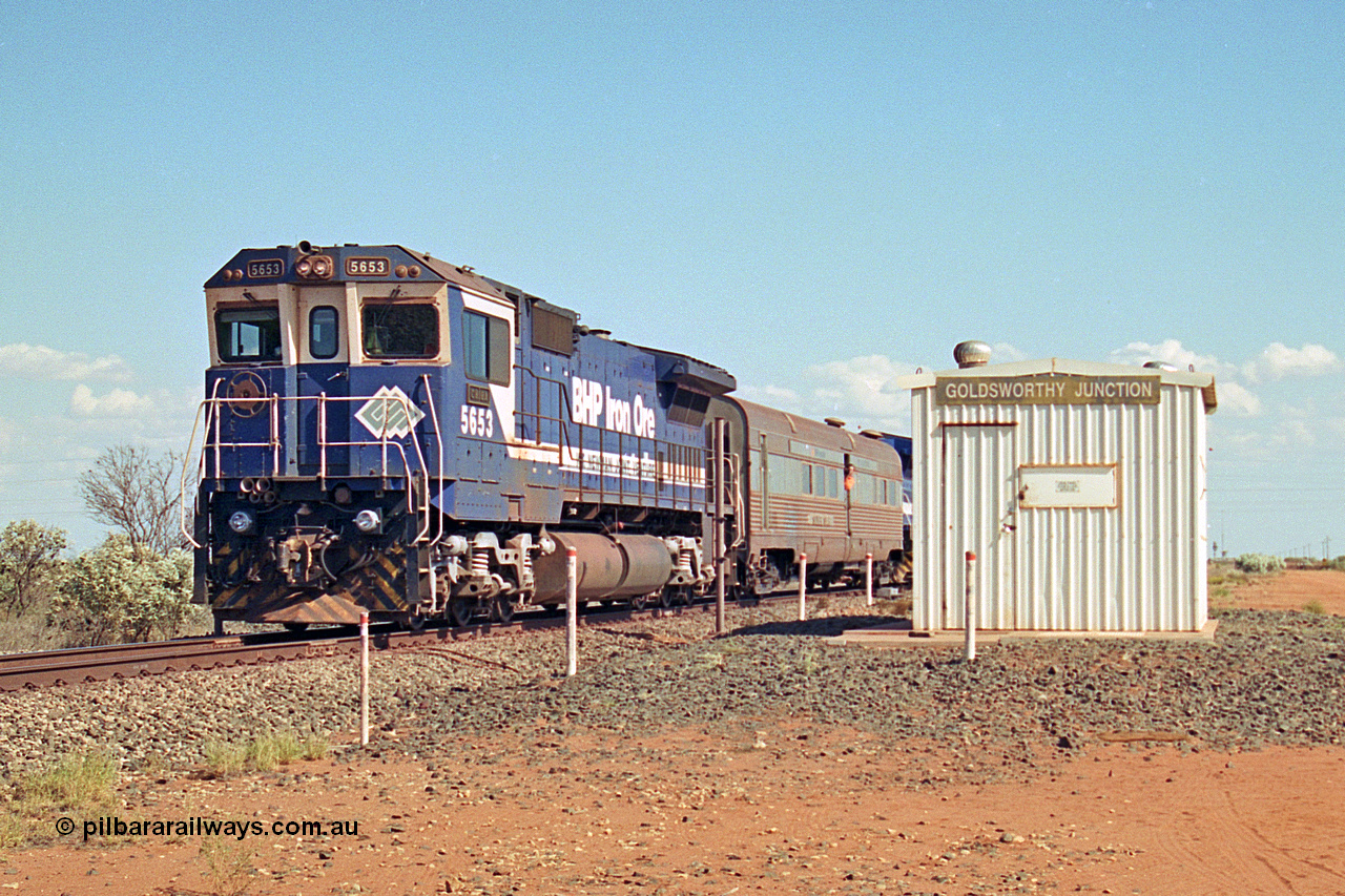 269-22
Goldsworthy Junction, and the Alstom 25-year service agreement special led by BHP Iron Ore's Goninan GE rebuild CM40-8M unit 5653 'Chiba' serial number 8412-10 / 93-144 heads back to Nelson Point with The Sundowner and 5634 on the rear of the train. Friday 12th of April 2002.
Keywords: 5653;Goninan;GE;CM40-8M;8412-10/93-144;rebuild;AE-Goodwin;ALCo;M636C;5484;G6061-5;