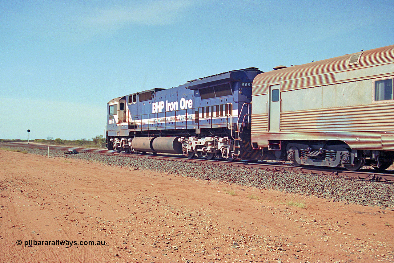 269-24
Goldsworthy Junction, and the Alstom 25-year service agreement special led by BHP Iron Ore's Goninan GE rebuild CM40-8M unit 5653 'Chiba' serial number 8412-10 / 93-144 heads back to Nelson Point with The Sundowner and 5634 on the rear of the train. Friday 12th of April 2002.
Keywords: 5653;Goninan;GE;CM40-8M;8412-10/93-144;rebuild;AE-Goodwin;ALCo;M636C;5484;G6061-5;