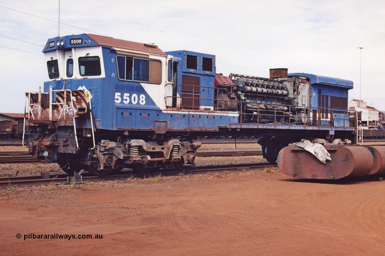 283-09
Nelson Point, BHP 's retired Goninan ALCo to GE rebuild C36-7M unit 5508 serial number 4839-04 / 87-073 is being prepared for road transport to Goninan in Perth. It will go on to be rebuilt and leased to Rio Tinto as 5052. May 2002.
Keywords: 5508;Goninan;GE;C36-7M;4839-04/87-073;rebuild;AE-Goodwin;ALCo;C636;5466;G6041-2;