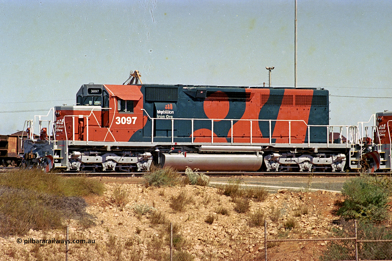 284-01
Port Hedland, Nelson Point hard stand area, BHP Billiton EMD SD40R unit 3097 serial 31569 and originally Southern Pacific SD40 SP 8409 is the final member of the SD40 units and has just been unloaded, August 7, 2004.
Keywords: 3097;EMD;SD40R;31569/7875-10;SD40;SP8409;