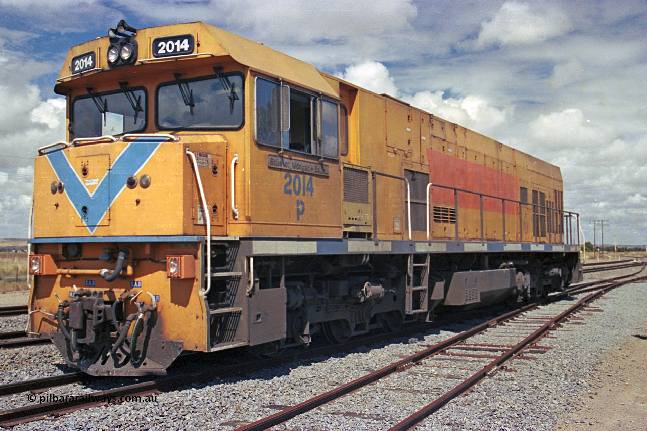 284-23
Narngulu, Geraldton, former Westrail P class loco P 2014 'Shire of Wongan-Ballidu' built by Goninan WA as a GE CM25-8 model with serial number 6320-12 / 90-099 sits in the yard in-between shunt movements. November 10, 2004.
Keywords: P-class;P2014;Goninan-WA;GE;CM25-8;6320-12/90-099;