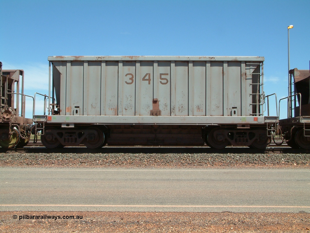 040409 122938
Boodarie, Goldsworthy service bottom discharge Portec USA built ore waggon 345 is one of ten that was purchased second hand in 1992 from Phelps Dodge Copper Mine, believed to be built in 1980s. 9th April 2004.
Keywords: 345;Portec-USA;BHP-ore-waggon;