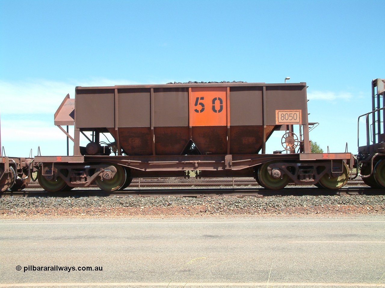 040409 123032
Boodarie, Goldsworthy service bottom discharge Tomlinson Steel WA built ore waggon 8050. 9th April 2004.
Keywords: 8050;Tomlinson-Steel-WA;GML-waggon;BHP-ore-waggon;
