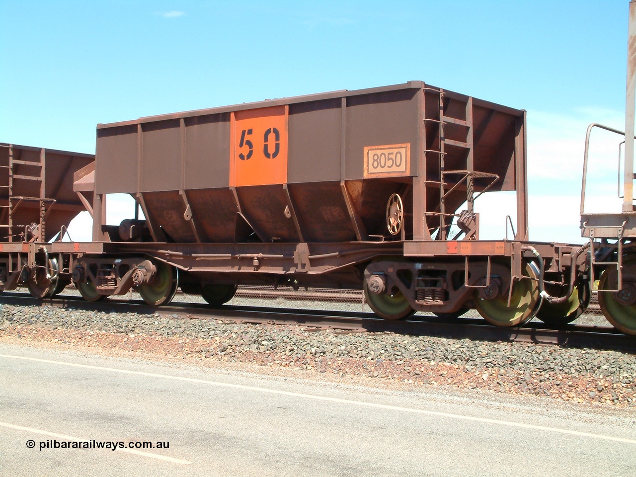 040409 123052
Boodarie, Goldsworthy service bottom discharge Tomlinson Steel WA built ore waggon 8050. 9th April 2004.
Keywords: 8050;Tomlinson-Steel-WA;GML-waggon;BHP-ore-waggon;
