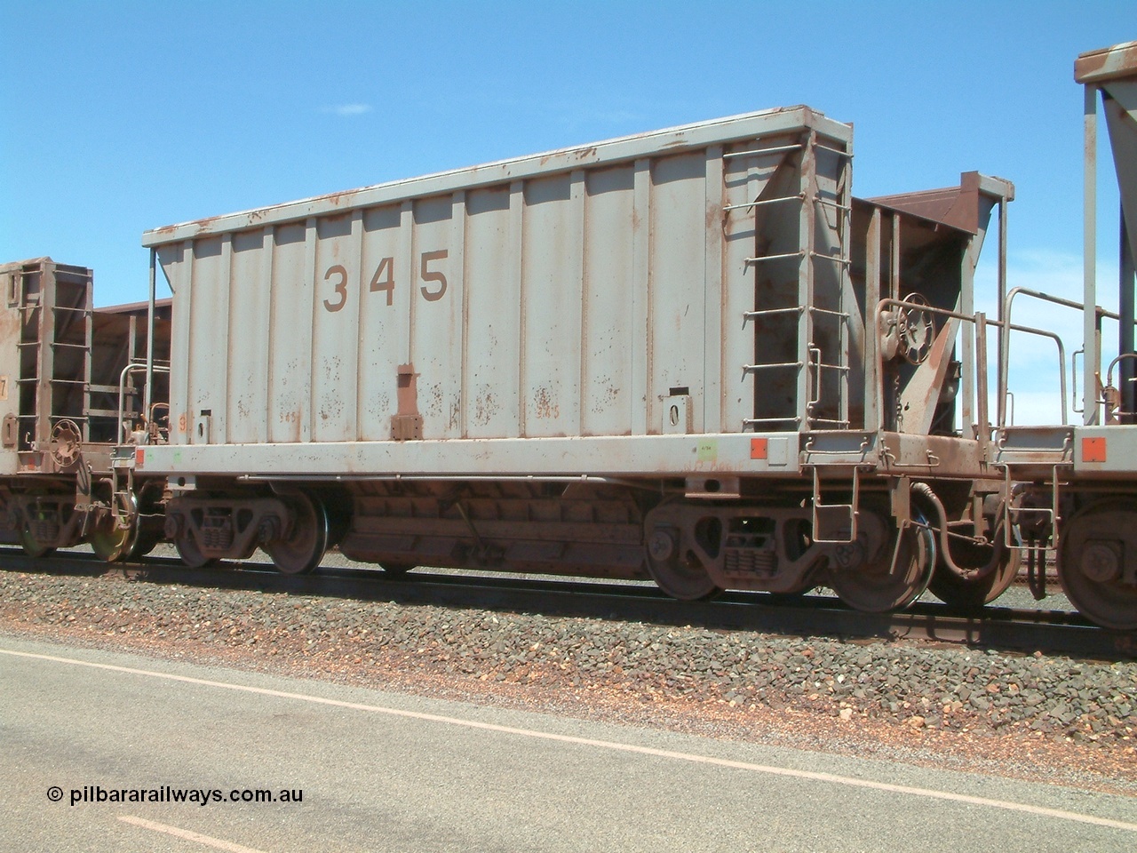 040409 123128
Boodarie, Goldsworthy service bottom discharge Portec USA built ore waggon 345 is one of ten that was purchased second hand in 1992 from Phelps Dodge Copper Mine, believed to be built in 1980s. 9th April 2004.
Keywords: 345;Portec-USA;BHP-ore-waggon;