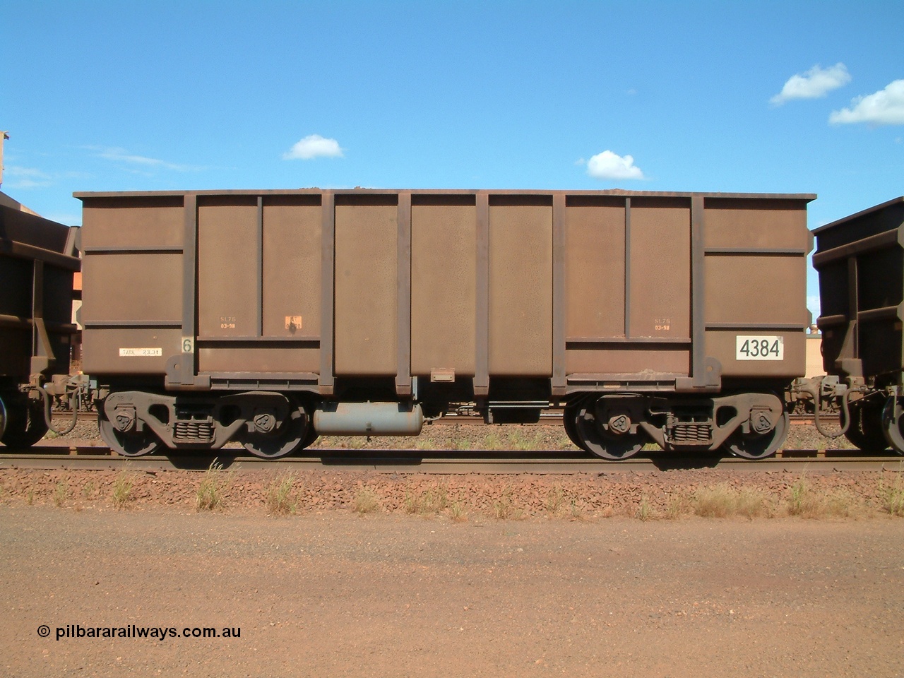 040412 143234
Nelson Point, a Goninan built ore waggon 4384, one of 126 such waggons constructed during 1997 out of 3CR12 stainless steel in an effort to eliminate painting and to reduce wear on the waggon body. Note the rounded bottom edge and tapered floor, this design was designated HC7081. 12th April 2004.
Keywords: 4384;Goninan-WA;BHP-ore-waggon;