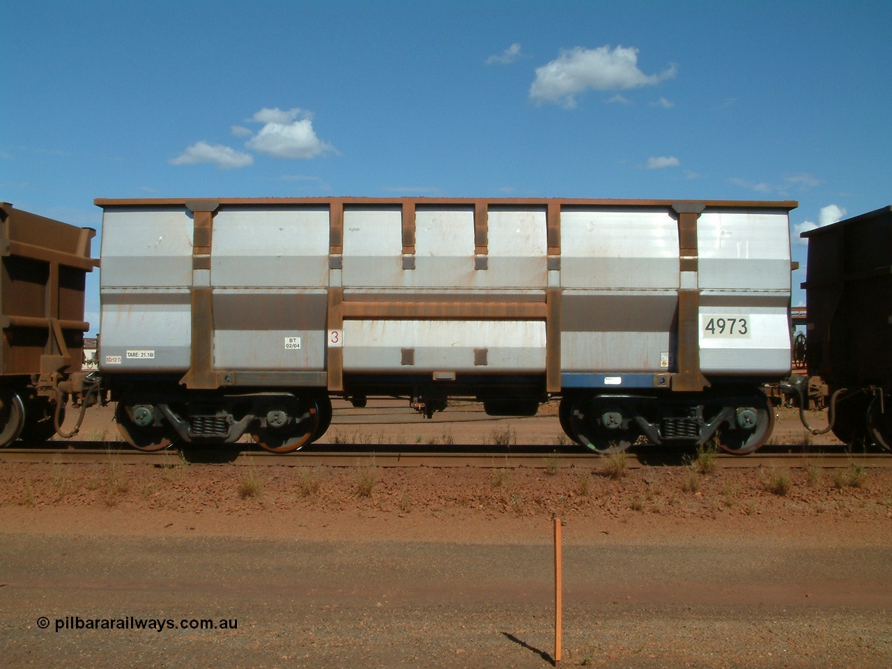 040412 143652
Nelson Point, Goninan built, Lynx Engineering designed ore waggon 4973 made from 5Cr12Ti stainless steel these waggons are known as Golynx waggons, asset number 2032597 with build date 02/2004. 12th April 2004.
Keywords: 4973;Goninan-WA;Golynx;BHP-ore-waggon;