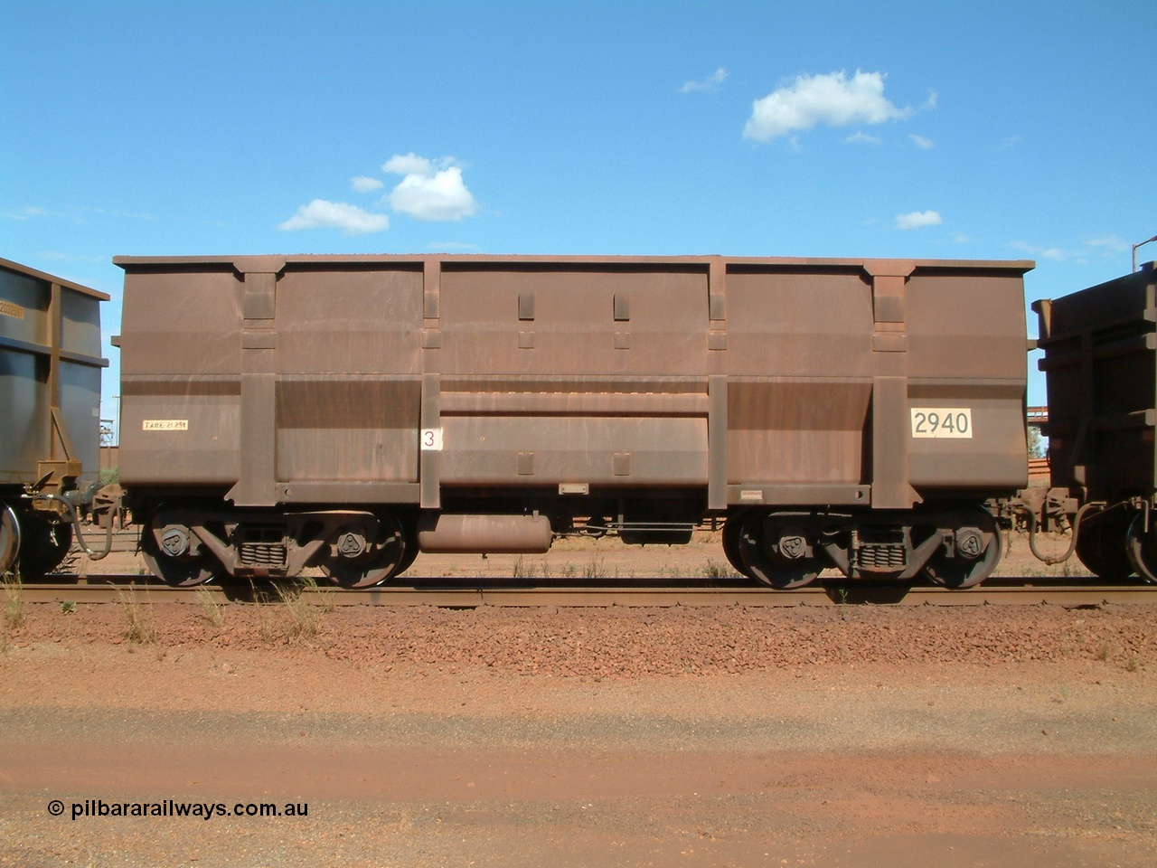 040412 143710
Nelson Point, Goninan built, Lynx Engineering designed ore waggon 2940 are known as Golynx waggons, one of 345 such waggons constructed during 2001 out of 3CR12 stainless steel in an effort to eliminate painting and to reduce wear on the waggon body. 12th April 2004.
Keywords: 2940;Goninan-WA;Golynx;BHP-ore-waggon;