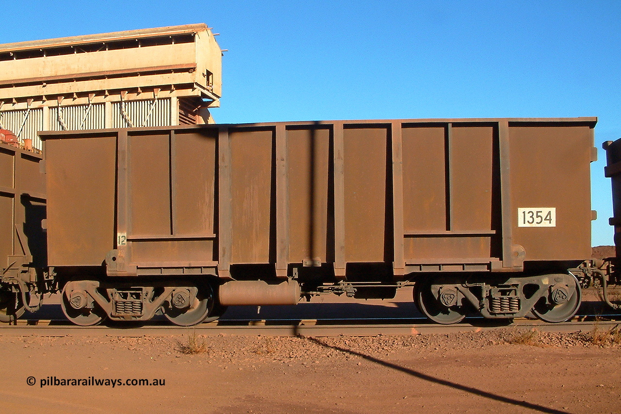 040804 155910
Nelson Point, empty BHP ore waggon 1354 is a Comeng WA build from a batch of two hundred and twenty-six in 1973/74. Side view of waggon with resheeted side walls. 4th of August 2004.
Keywords: 1354;Comeng-WA;BHP-ore-waggon;