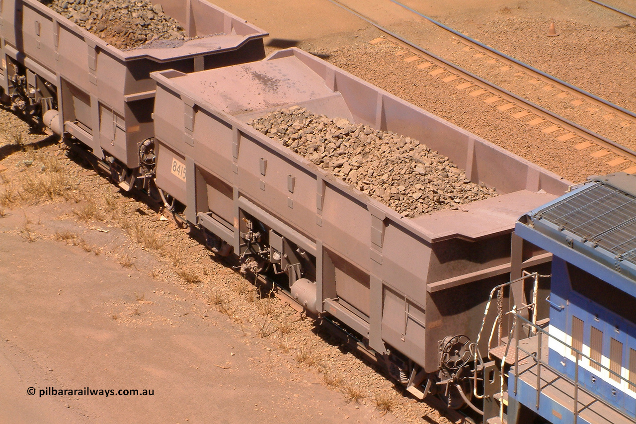 040912 132238r
Nelson Point, view from above of BHP ore waggon 8415 showing the internal plates fitted for the bottom discharge arrangement of the Goninan WA build of the Golynx design built in November 2001 as a bottom discharge waggon for Goldsworthy service with serial number 950088-345. 12th of September 2004.
Keywords: 8415;Goninan-WA;Golynx;BHP-ore-waggon
