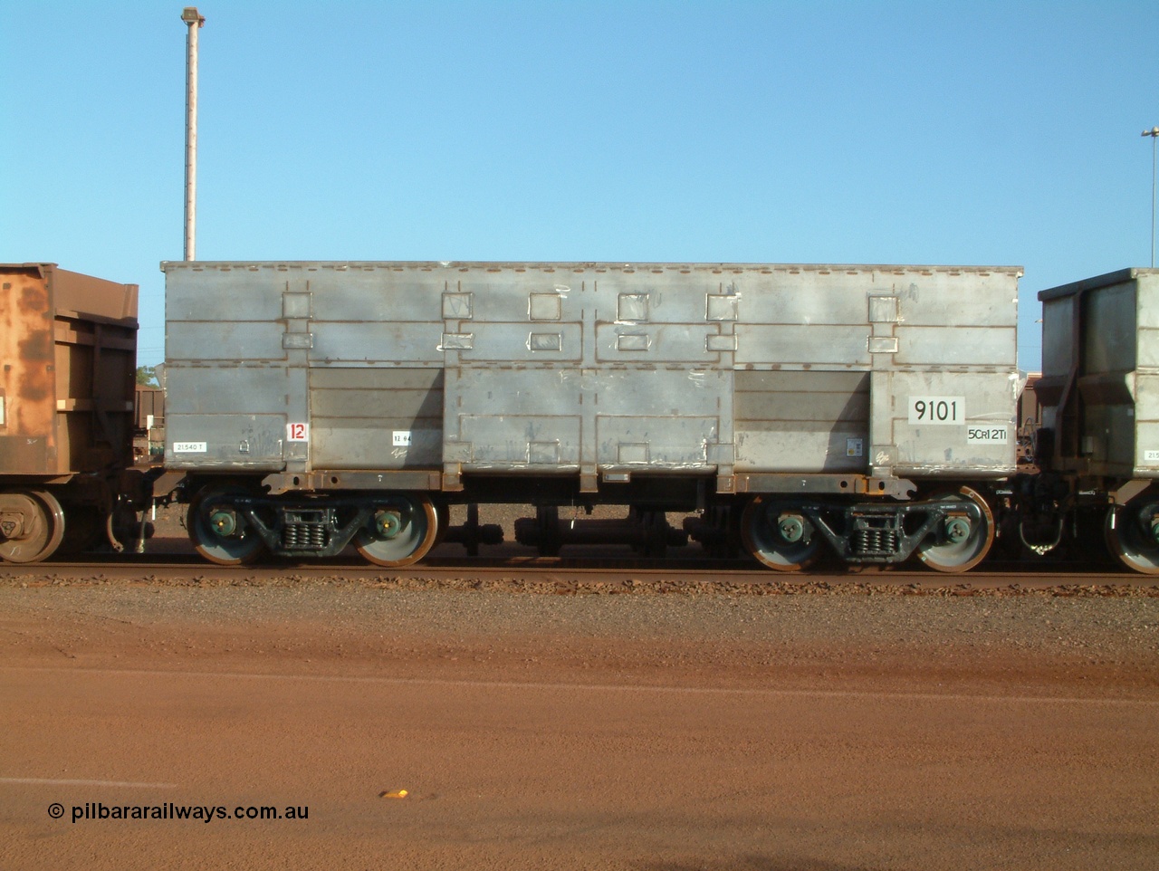 041225 064654
Nelson Point Ore Car Repair Shops, brand new Bradken NSW built ore waggon 9101 asset number 2031703. These waggons are the latest additions to the fleet with 20 on order in total. They are made from the same 5Cr12Ti steel that the Goninan Golynx waggons are made. 25th December 2004.
Keywords: 9101;Bradken-NSW;BHP-ore-waggon;