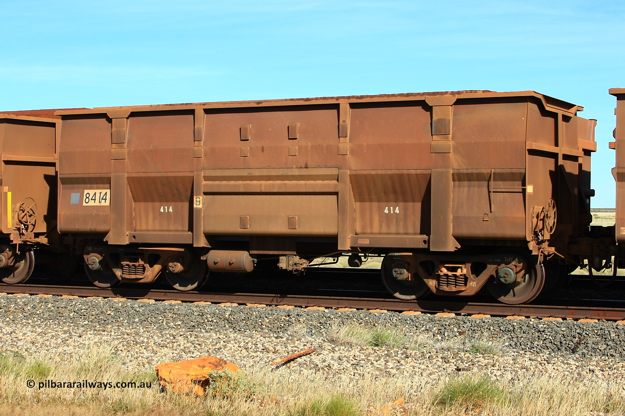 110620 2031r
Walla Siding, empty BHP ore waggon 8414 is a Goninan WA build of the Golynx design built in November 2001 as a bottom discharge waggon for Goldsworthy service with serial number 950088-344. Now converted to rotary dump operation. 20th of June 2011.
Keywords: 8414;Goninan-WA;Golynx;950088-344;GML-waggon;BHP-ore-waggon;