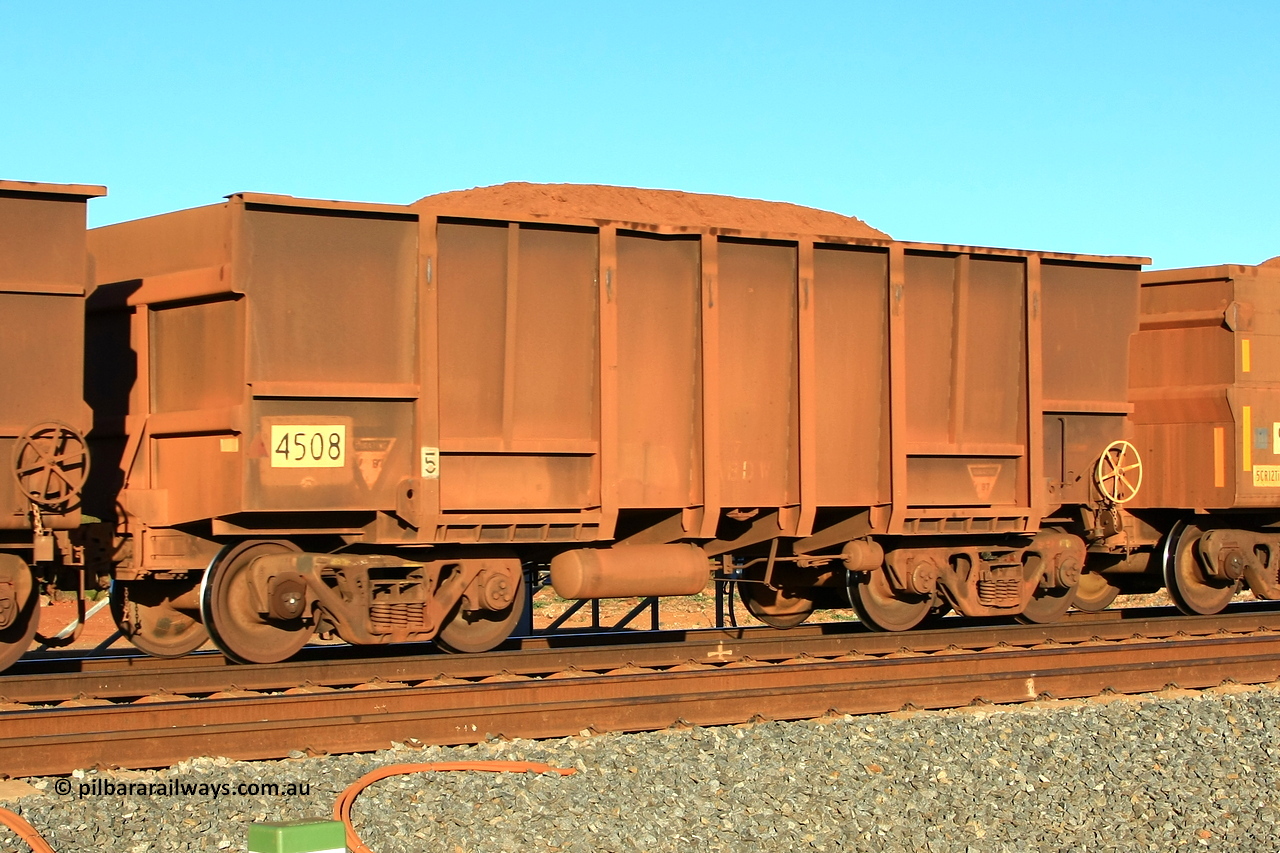 110620 2320r
Walla, loaded BHP ore waggon 4508, one of eighteen built by Transfield WA in 1976 with a tapered floor. 20th of June 2011.
Keywords: 4508;Transfield-WA;BHP-ore-waggon