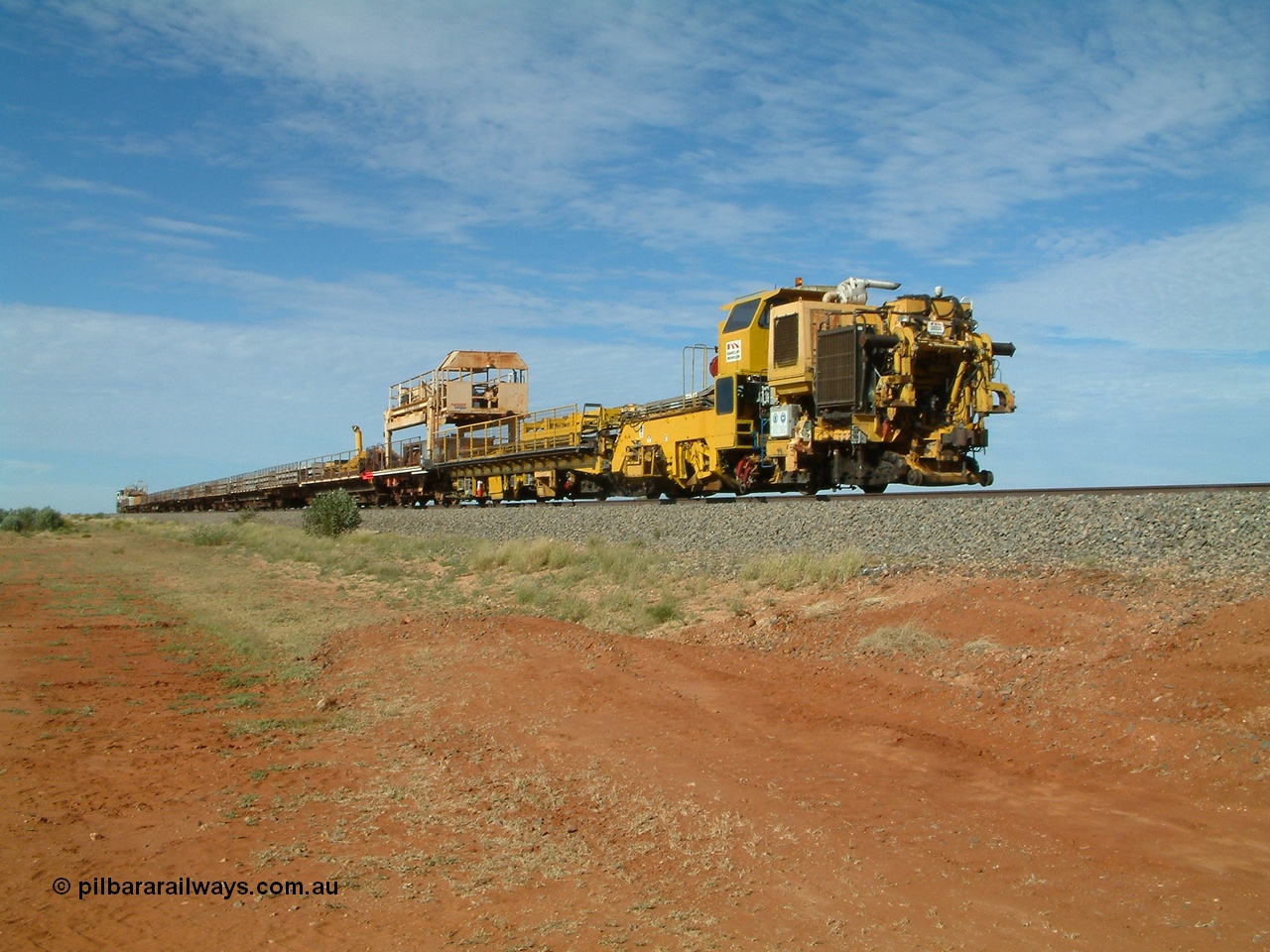 040502 085614
Mooka Siding, trailing view of the 'Pony' heading south, with the Harsco Pony track re-laying machine on the rear.
Keywords: Harsco;BHP-pony-waggon;Pony-Track-Relayer;
