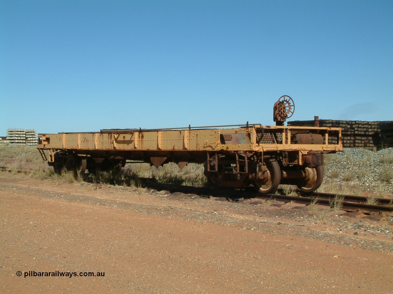 040806 101910
Flash Butt yard, heavily stripped down riveted waggon 206, possible original ballast waggon, number 206 was originally a waggon in the 'Camp Train' and appears to have USA origin, 3/4 view from handbrake end.
