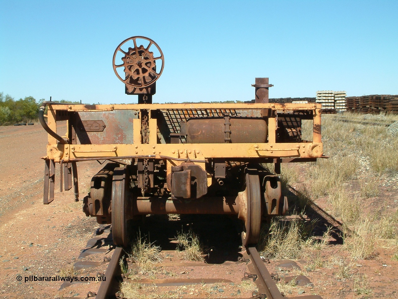 040806 102142
Flash Butt yard, heavily stripped down riveted waggon 206, possible original ballast waggon, number 206 was originally a waggon in the 'Camp Train' and appears to have USA origin, view of handbrake end.
