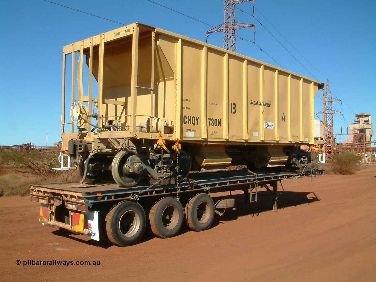 040814 091958
Nelson Point, CFCLA ballast waggon CHQY type 730 just being delivered to BHP Iron Ore as part of the Rail PACE project, 3/4 view from handbrake end.
Keywords: CHQY-type;CHQY730;CFCLA;CRDX-type;BHP-ballast-waggon;