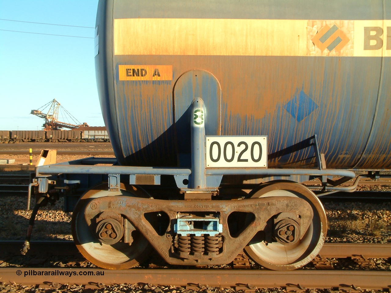 040815 171406
Nelson Point, side view of A end and bogie detail view of fuel tank waggon 0020, 82 kilolitre capacity built by Comeng NSW for BP as RTC 2, used by Mt Newman Mining, unsure when converted to 0020.
Keywords: Comeng-NSW;BP-Oil;RTC2;BHP-tank-waggon;
