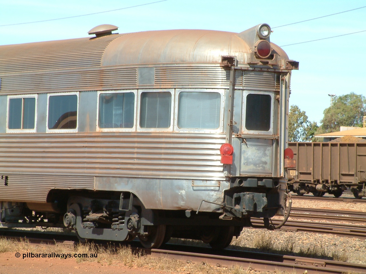 040912 142144
Nelson Point, Silver Star observation coach, 'Sundowner', 3/4 view of rear end, shows lighting arrangement, end of train markers. Originally built by E. G. Budd in 1939 numbered 301 as the Silver Star as a diner-parlour-observation coach on the Chicago, Burlington and Quincy Railroad's General Pershing Zephyr train from the 1930s and 1940s. Donated to Mt Newman Mining Co. by AMAX an original joint venture partner to commemorate the projects first 100 million tonnes of iron ore railed between Mount Whaleback mine and the Port Hedland port.
Keywords: Silver-Star;EG-Budd;Sundowner;General-Pershing-Zephyr;301;