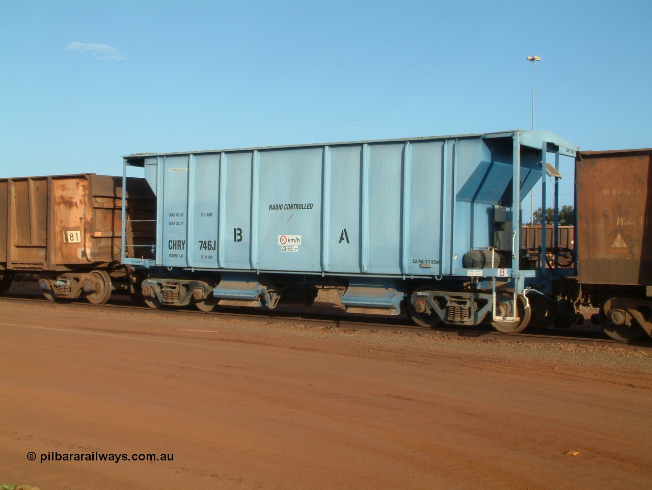 041225 064712
Nelson Point Ore Car Repair Shops, CFCLA leased ballast waggon CHRY type CHRY 746, a fleet of these cars were leased to BHP, and are known as the 'PACE Cars', after the expansion project of the same name. 25th December 2004.
Keywords: CHRY-type;CHRY746;CFCLA;CRDX-type;BHP-ballast-waggon
