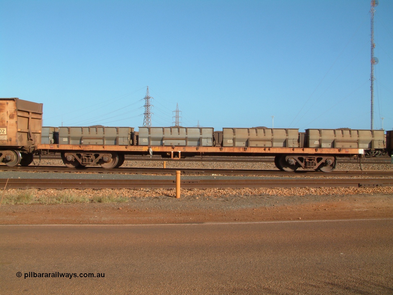 041225 070523
Nelson Point, Ore Car Repair Shop roads, flat waggon no. 5, later renumbered 6705. Originally in service with Goldsworthy Mining as a BC or BCV box van, built by Comeng WA in 1966.
Keywords: Comeng-WA;GML;BC-type;BHP-Flat-Waggon