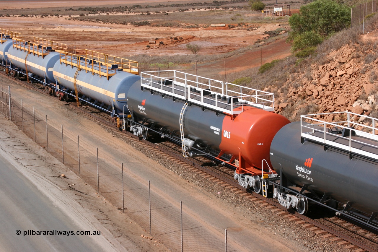 050315 0234
Redbank Bridge, elevated view of empty 116 kL fuel tanks all built by Comeng in both NSW and WA, 0015 in the Earth livery and 0017 and others in the BHP blue and white livery.
Keywords: Comeng-WA;BHP-tank-waggon;