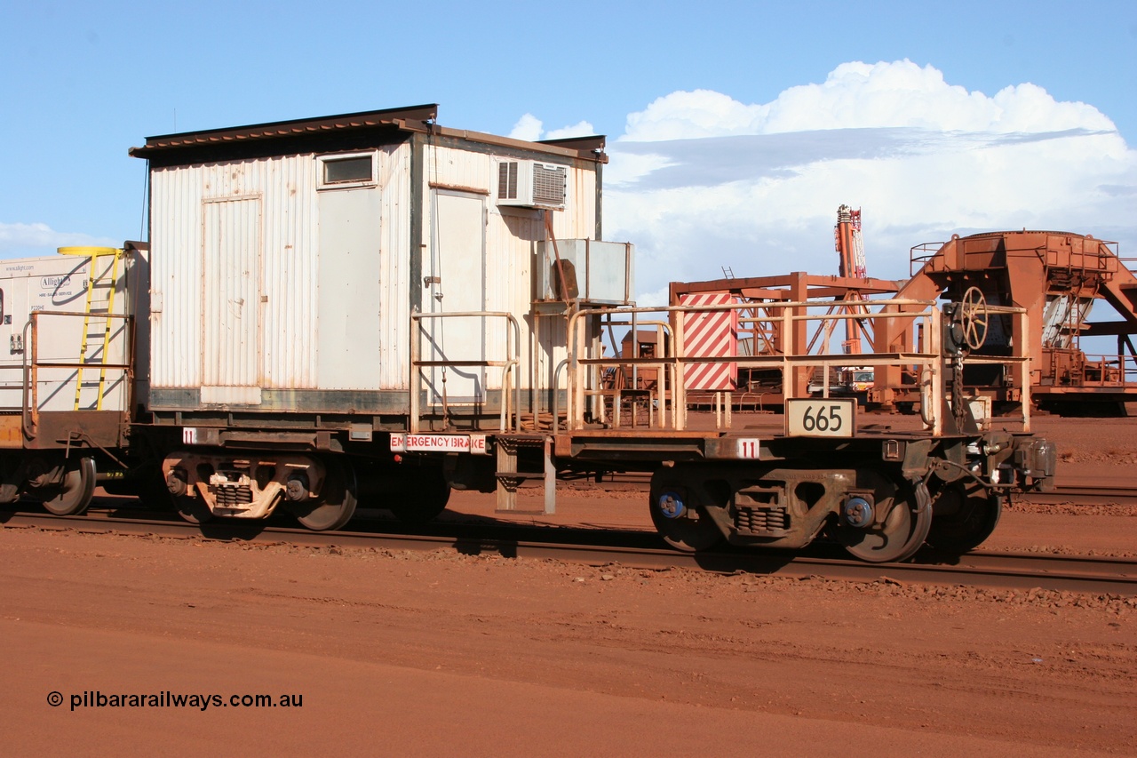 050319 0138
Nelson Point, cut down Magor USA built former Oroville Dam 91 ton ore waggon 665, seen here being used as the crib waggon on the steel train.
Keywords: Magor-USA;BHP-rail-train;