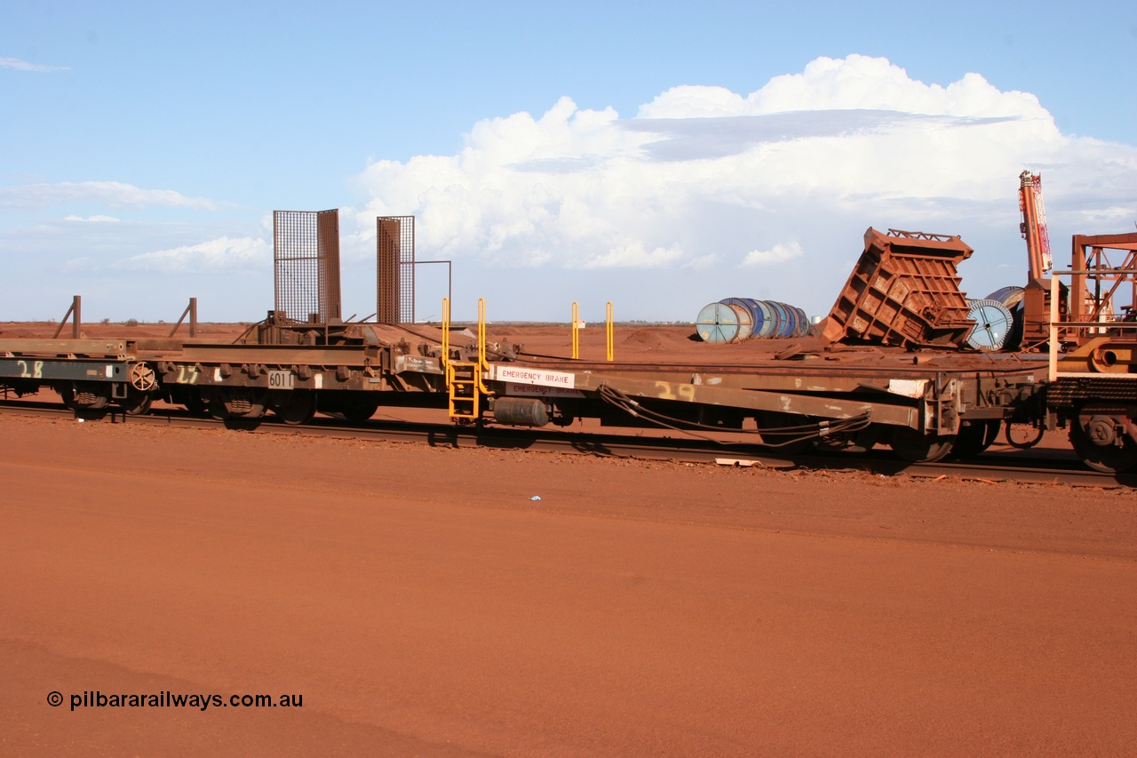 050319 0142
Nelson Point, rail recovery and transport train, 1st lead off waggon 6011, built by Scotts of Ipswich 04-09-1970, the mesh guarding is for the winch cable. The chute arrangement for the discharging and recovery of rail is visible.
Keywords: Scotts-Qld;BHP-rail-train;